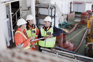 workers-discussing-on-a-ship-deck-800KB